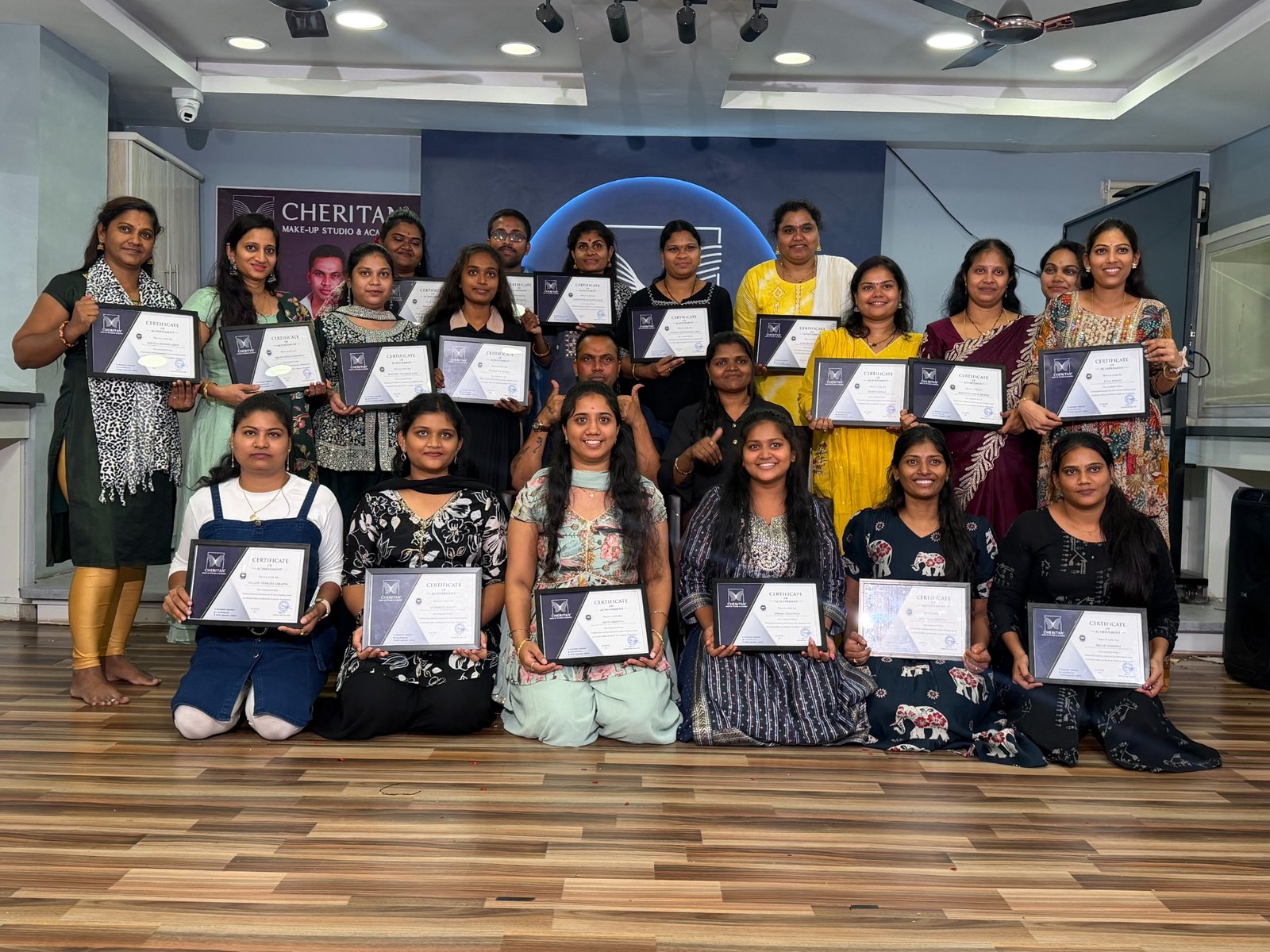 Cheritan makeup course students with certificates